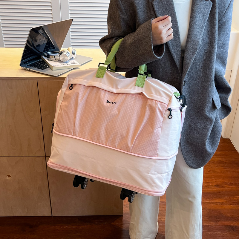 Large capacity swivel wheel luggage bag